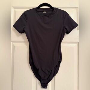 Skims T-Shirt bodysuit Size L. Black. Excellent condition.